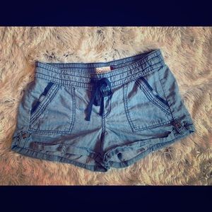 Blue shorts with rolled hem